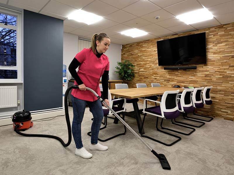 Cleaning carpet in office