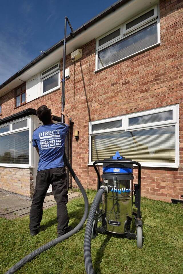 Gutter cleaning with a vacuum