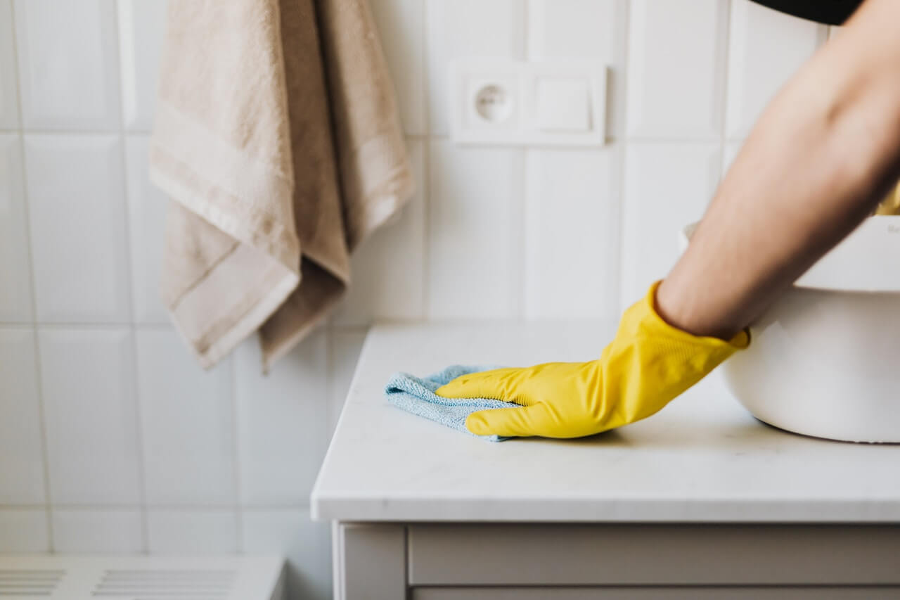 cleaning bathroom counter